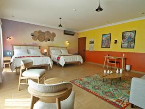 Postelja oz. postelje v sobi nastanitve Hotel Boutique Típico