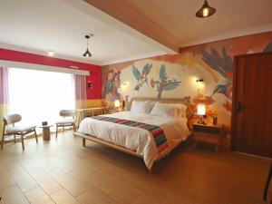 Postel nebo postele na pokoji v ubytování Hotel Boutique Típico