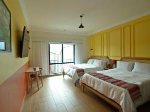 Postelja oz. postelje v sobi nastanitve Hotel Boutique Típico