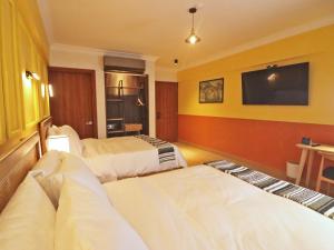 TV in/ali zabaviščno središče v nastanitvi Hotel Boutique Típico