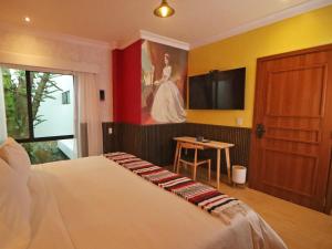 Postelja oz. postelje v sobi nastanitve Hotel Boutique Típico