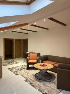 Posezení v ubytování Center Apartments The Quiet Luxury 5