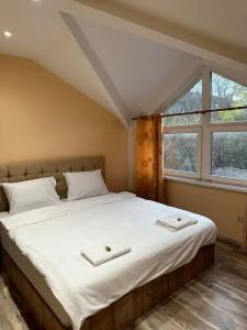 Postel nebo postele na pokoji v ubytování Center Apartments The Quiet Luxury 5