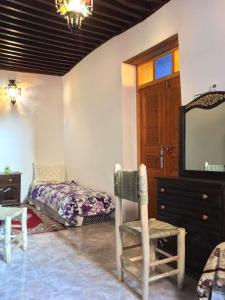 Postel nebo postele na pokoji v ubytování House andalous