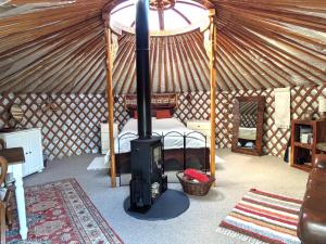 Go Eco Glamping客房内的一张或多张床位
