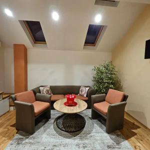 Et opholdsområde på Center Apartments The Quiet Luxury 7 + 3 billeder