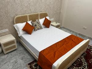 Ένα ή περισσότερα κρεβάτια σε δωμάτιο στο The Little Experience, Jaipur
