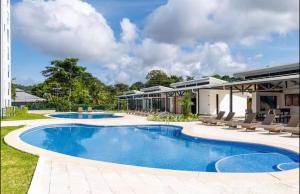 an image of a swimming pool in a house at Grettabril JACO BEACH APARTMENT in Jacó
