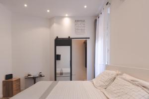 Postel nebo postele na pokoji v ubytování Studio City