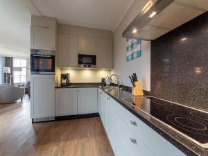 Η κουζίνα ή μικρή κουζίνα στο Holiday Home near Dutch Beaches