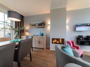 Η κουζίνα ή μικρή κουζίνα στο Holiday Home near Dutch Beaches