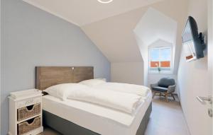 Postel nebo postele na pokoji v ubytování Baltischer Hof Apartment 63
