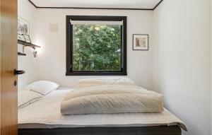 Katil atau katil-katil dalam bilik di 3 Bedroom Stunning Home In Hasle