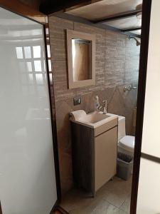 Koupelna v ubytování Cabaña de Grangelo