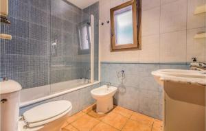 A bathroom at Beautiful Home In Sant Miquel Daro