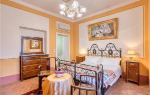 Łóżko lub łóżka w pokoju w obiekcie Villa Pieve, Lucignano
