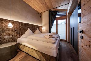 Posteľ alebo postele v izbe v ubytovaní Loft in the Alps Penthouse