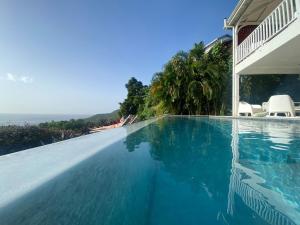 Bazén v ubytování REVE BLEU - Villa classée 4* vue mer - 6 pers nebo v jeho okolí