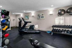 a room with a gym with a treadmill and weights at Best Western Niceville - Eglin AFB Hotel in Niceville