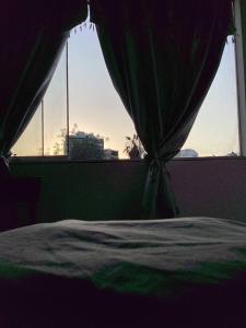 Postel nebo postele na pokoji v ubytování Hostel Barranco Sunset