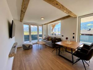 Televízia a/alebo spoločenská miestnosť v ubytovaní Apartment in Saalfelden near Ski Slopes