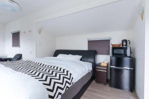 Postel nebo postele na pokoji v ubytování Mount Fuji Panorama Glamping