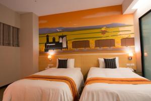 ภาพในคลังภาพของ Travel Art Inn ในนครเจียอี้