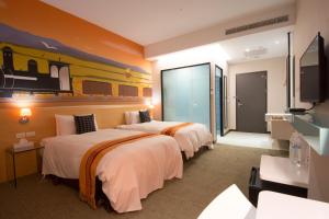 ภาพในคลังภาพของ Travel Art Inn ในนครเจียอี้