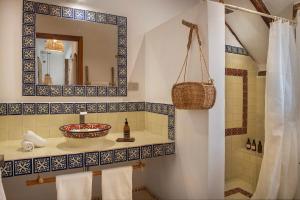 Koupelna v ubytování Mawimbi Boutique Hotel