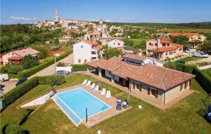 an aerial view of a house with a swimming pool at Villa Ciano in Višnjan