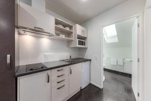 Kuchyň nebo kuchyňský kout v ubytování 315 Motel Riccarton + 37 fotografií