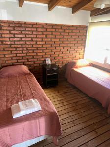 Postel nebo postele na pokoji v ubytování Kaizen Apart