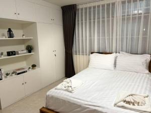เตียงในห้องที่ 10MIN 曼谷独栋Chatuchack,Kasetsart精品别墅 MYSTORY HOUSE