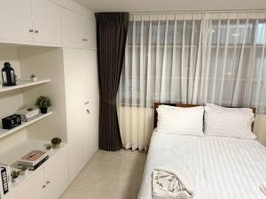 เตียงในห้องที่ 10MIN 曼谷独栋Chatuchack,Kasetsart精品别墅 MYSTORY HOUSE