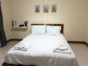 เตียงในห้องที่ 10MIN 曼谷独栋Chatuchack,Kasetsart精品别墅 MYSTORY HOUSE