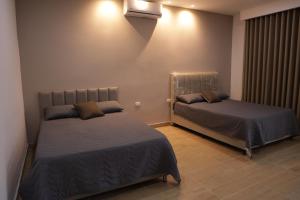 Ένα ή περισσότερα κρεβάτια σε δωμάτιο στο La Maye casa finca