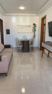 Et opholdsområde på Apartamento SN Orlando Dantas + 18 billeder