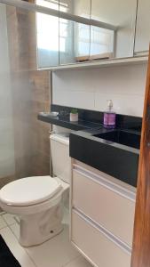 Et badeværelse på Apartamento SN Orlando Dantas