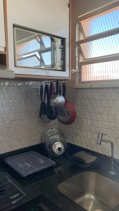 Kuchyň nebo kuchyňský kout v ubytování Apartamento SN Orlando Dantas