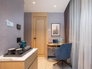 Istumisnurk majutusasutuses Country Inn & Suites by Radisson Shenzhen International Convention and Exhibition Center