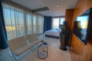 TV a/nebo společenská místnost v ubytování SU29 Boutique Hotel