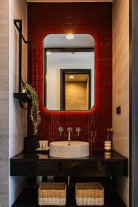 a bathroom with a sink and a mirror at Luxury Condo Edge Central Pattaya in Pattaya Central +28 photos