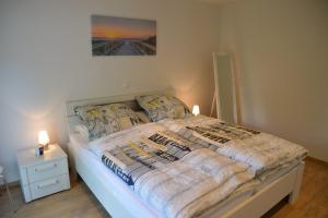 Ένα ή περισσότερα κρεβάτια σε δωμάτιο στο Stadtidyll