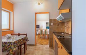 Kuchyň nebo kuchyňský kout v ubytování Apartment Kunfin V