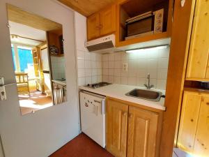Kuchyň nebo kuchyňský kout v ubytování Studio cosy 17m² pour 2 pers. à Plan Peisey, animaux admis - FR-1-757-111