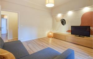 Un televizor și/sau centru de divertisment la Gorgeous Apartment In Genova With Wifi +13 fotografii