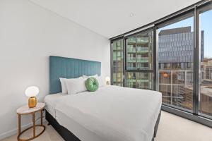 Postel nebo postele na pokoji v ubytování Brisbane Skytower by CLLIX + 37 fotografií