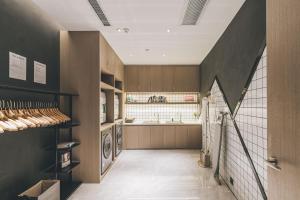 Η κουζίνα ή μικρή κουζίνα στο Atour Hotel Suzhou New District Mudu Universiade City