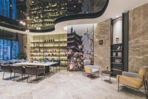 Χώρος καθιστικού στο Atour Hotel Suzhou New District Mudu Universiade City