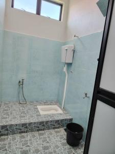 Phòng tắm tại Bella Alfatih Homestay +4 ảnh